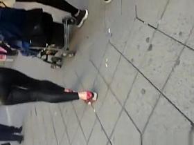 Woman in tight leather pants