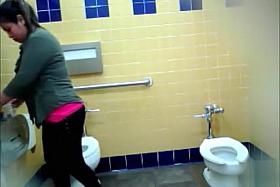 Curvy mommy urinates in the public WC