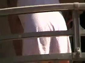 Voyeur 21, A babe no panties at her balcony