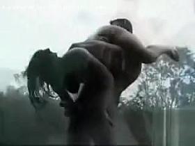 Simultaneous oral sex outdoors in the rain