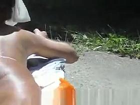 Jerking While She Tans