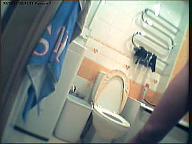 Girl in polka dot dress upskirt masturbation in toilet