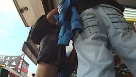 Latin MILF flaunts her butt before an upskirt voyeur