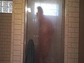 Old *** sitter viigorously rubbing clit and asshole in shower