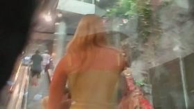 A super sexy blonde gets upskirt shots by a voyeur on the bus and beyond