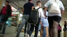 Miniature Girl With Pigtails