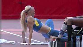Sexy blonde athletic warming up