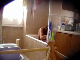 Hairy girl in bath - hidden cam
