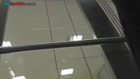 Auburn-haired babe wears a thong in upskirt vid