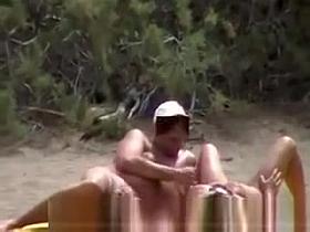 Nude couples on beach