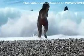 Accidental nudity shown in wavy water