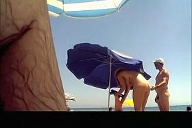 Voyeur films woman taking off her dress