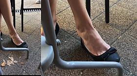 Cute girlfriend barefoot dangling in balerinas