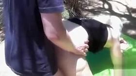 Swinger wife on her hands and knees takes dicks outdoors