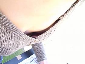 Flat chested Asian cutie lets us peek down her blouse