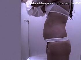 Chubby girl drying and dressing