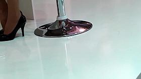 candid hostess pumps and stockinged footplay