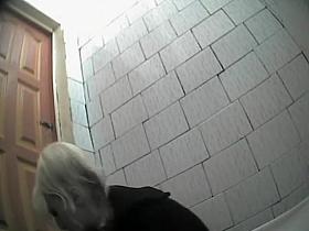 Girl in lace lingerie spied while pissing