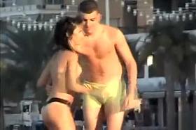 Italian girl fingered hard on the public beach