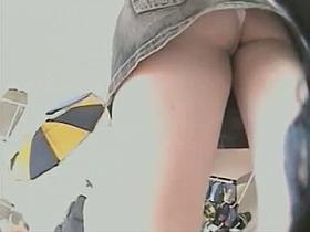 Great upskirt thong spy cam video of a juicy hiney