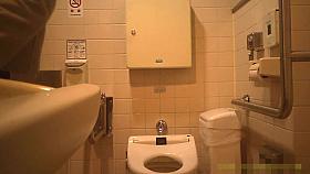 public rest room .mom talks with not her young daughter