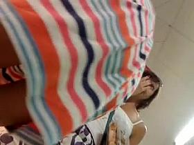 upskirt teen - risky shot with her mom next to her :-)