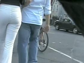 Street candid hot red head in tight pants and n ass out of this world