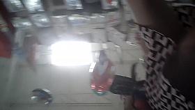 Upskirt girl gets the camera between her nice legs