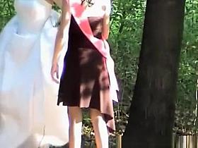 Bride and friend caught peeing outdoors