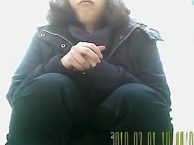 Chubby girl with hairy pussy pissing