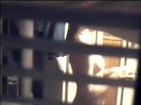 Window peeping - girl topless