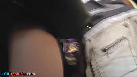 Skinny brunette participates in upskirt porno