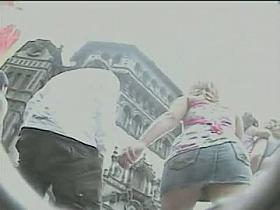 Upskirt video of a hot slightly chubby model with no panties