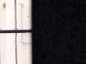 Peeping a sexy milf as she showers