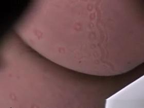 Blonde woman caught in public toilet pissing