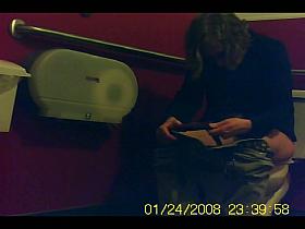 Real amateur fem spends some time pissing on toilet