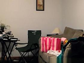 Asian chick getting naked while trying different bikinis