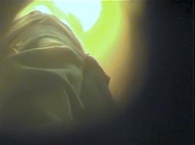 Natural shaggy tits admired by the changing room spycam