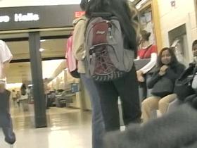 Cute brunette with tight ass in tight jeans