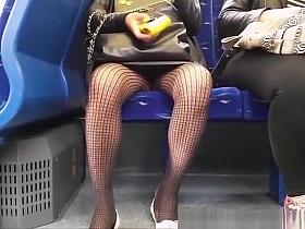 Woman with black fishnets upskirted