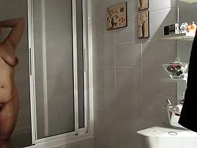 Chubby busty wife in bathroom drying