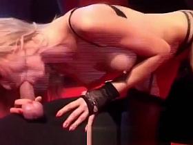 Blond strips and teases the crowd with her body and dildo