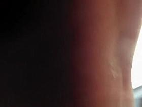 Brunette girl wearing short dress upskirt