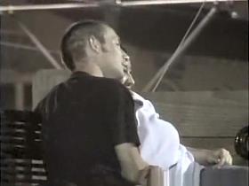 Man tries to lift big tits woman top