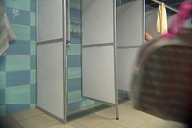 A hidden camera in a public shower films gorgeous women while they soap up their