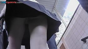 Upskirting vid of an auburn-hair gal in a public place