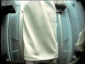 Long legged girl with panty pulled down pissing on toilet