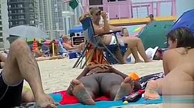 Two naked goddesses on the beach of Miami