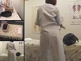Japanese babe with nice tits enjoys a massage on spy cam