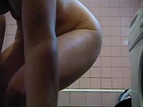 My mom washing in bathroom. Great body